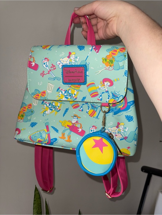 Loungefly Handbags - Loungefly Disney Parks Mini Backpack with Toy Story Print